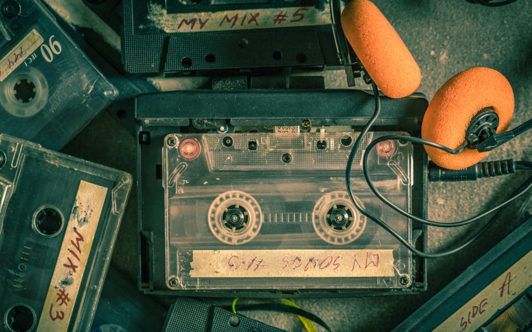 Cassette tape with walkman and headphones