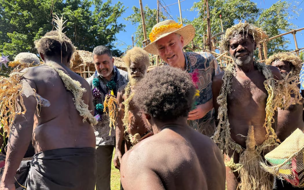Richard Marles met locals after a ceremonial event in Vanuatu on Wednesday. (ABC News: Lillyrose Welwel)