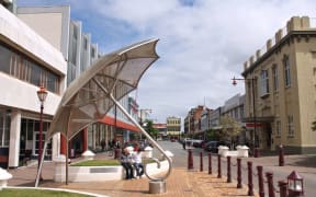 INVERCARGILL, NEW ZEALAND - FEBRUARY 24, 2008: People visit downtown Invercargill, New Zealand. Invercargill is one of the southernmost cities in the world. 54,200 people live here.