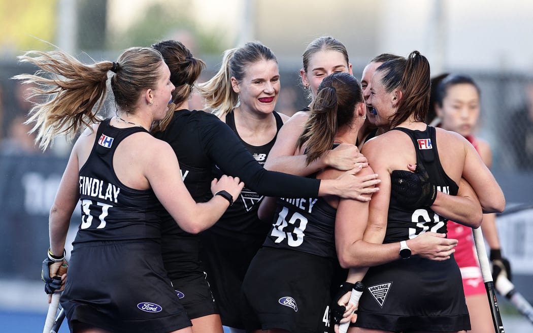 Black Sticks celebrate a goal by Rose Tynan against Japan.