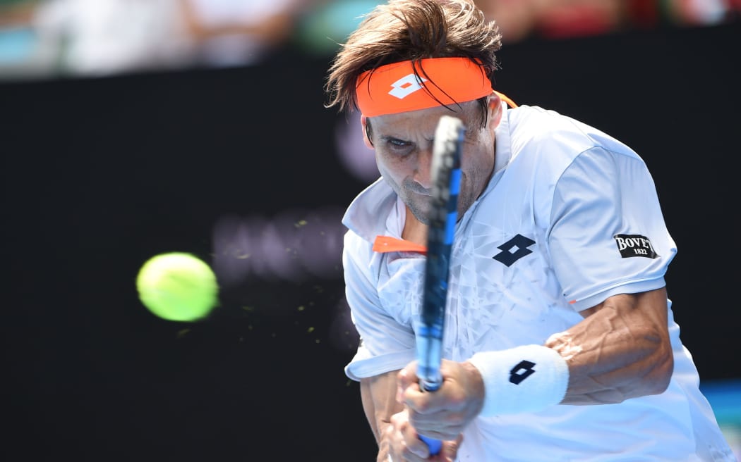 David Ferrer plays a backhand return against Andy Murray at the 2016 Australian Open, January 27, 2016. AFP PHOTO / WILLIAM WEST
