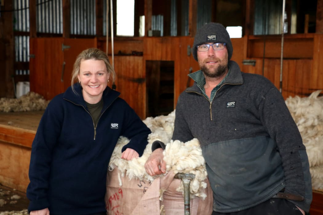 Julie and Murray wearing their West Ridge jerseys
