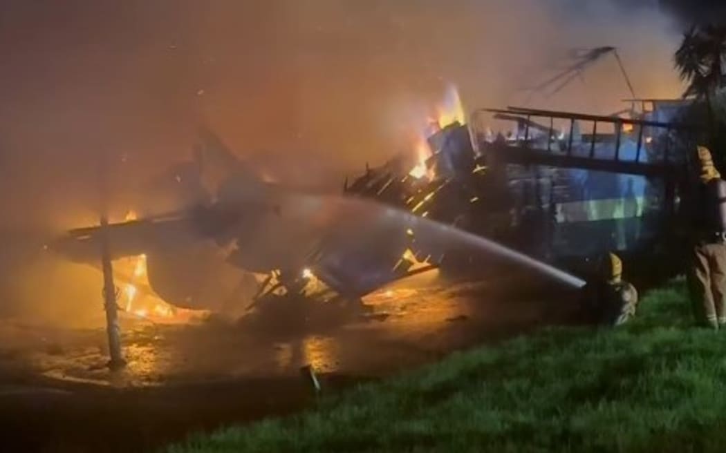 Historic ship The Tui on fire in Paihia on 4 June, 2025.
