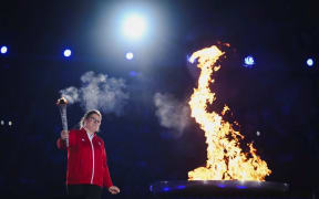 German athlete Sophie Rensmann lights the Flame of Hope at the Opening ceremony of the Special Olympics World Games