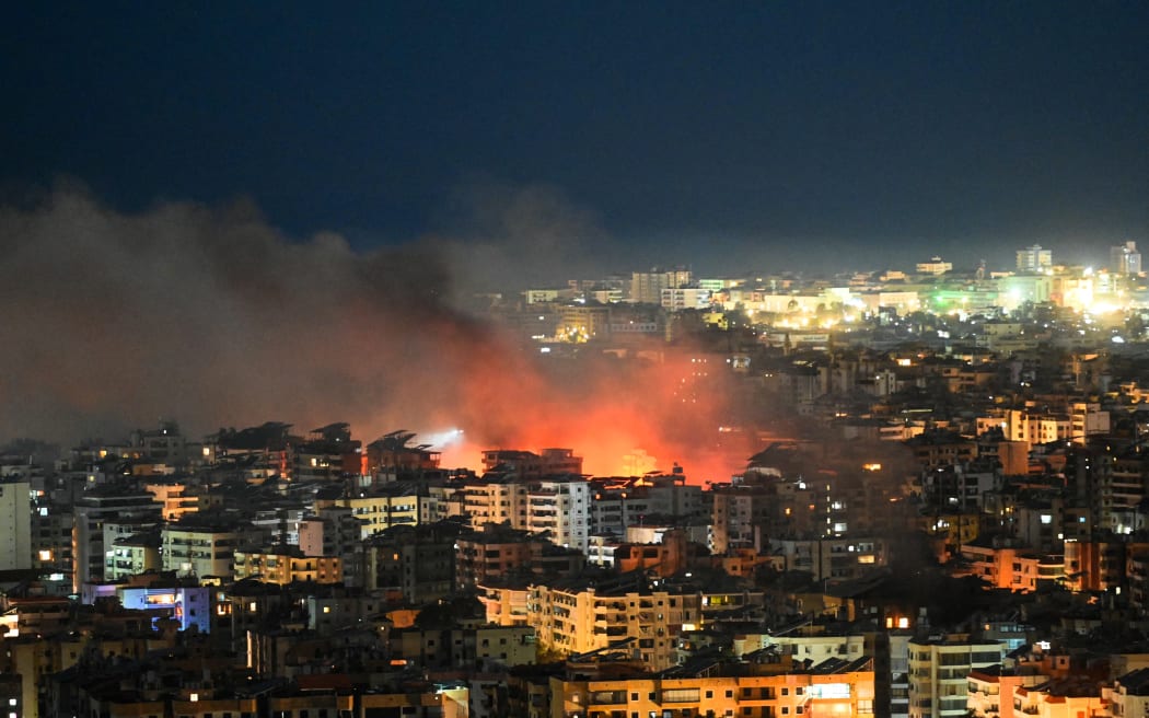 Fire rises from the site of an Israeli airstrike in the southern suburbs of Beirut early on March 6, 2026. Heavy attacks were reported in Tehran on March 6 after Israel said it was hitting "regime infrastructure" in a "new phase" of the war it launched with the United States against Iran. As the conflict entered its seventh day, its regional repercussions continued -- with Qatar saying it intercepted a drone targeting a US base, and Lebanon reporting the death toll from Israeli strikes had risen to 123. (Photo by FADEL itani / AFP)