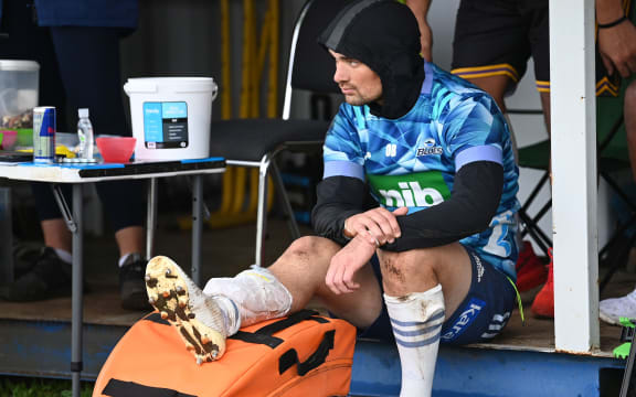 Otere Black rests up a lower leg injury at Blues training.