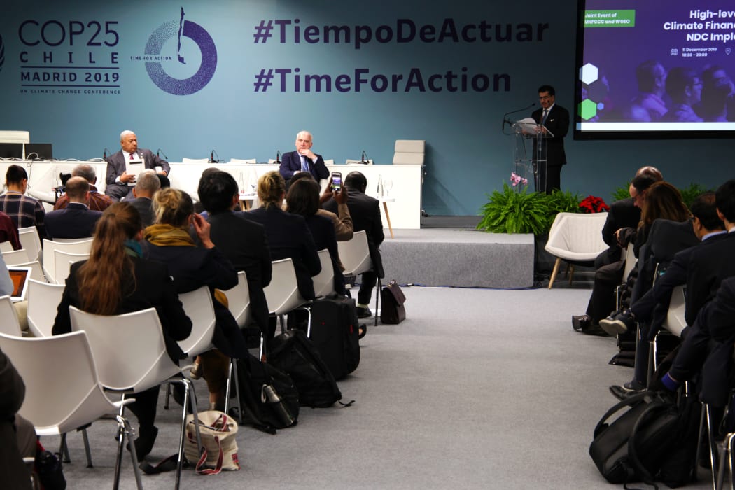 Fiji prime minister Frank Bainimarama (Back Left) takes part in a high level session on Climate Finance at the UN Climate Talks.
