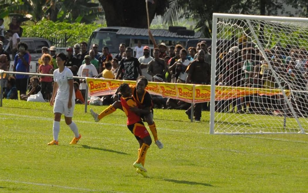 PNG's Meagan Gunemba celebrates her goal against New Zealand.