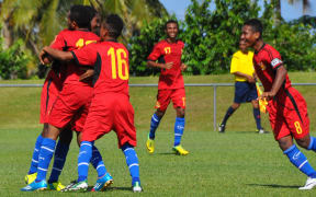 PNG players celebrate scoring a goal at the Oceania Under 17 Men's Football Championship.