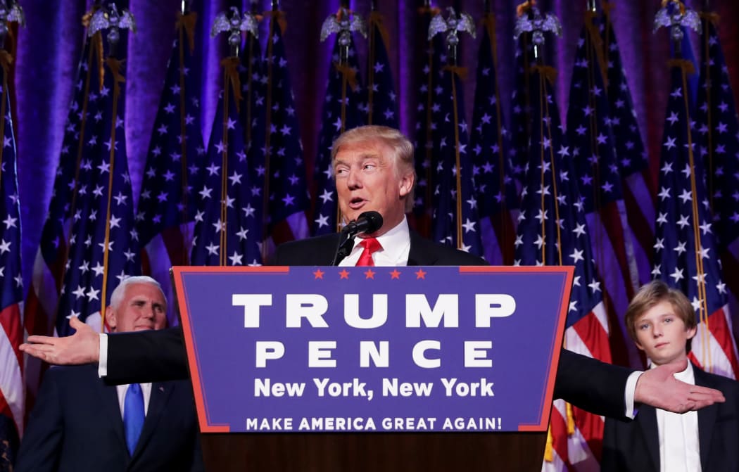 Republican president-elect Donald Trump delivers his acceptance speech during his election night event at the New York Hilton Midtown in the early morning hours of November 9, 2016 in New York City.