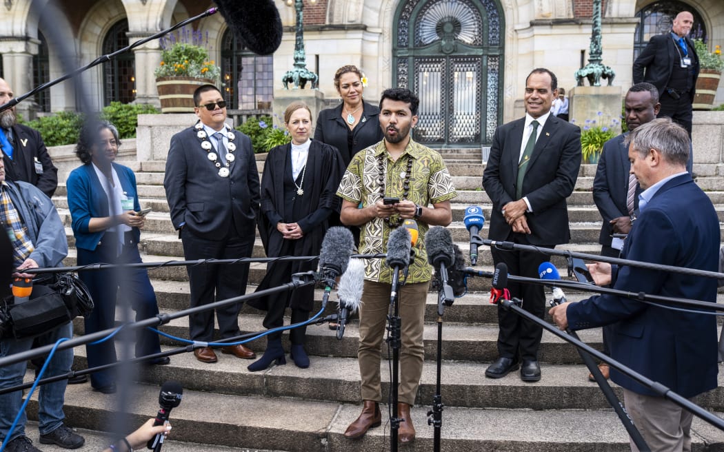 THE HAGUE - Vishal Prasad (Pacific Islands Students Fighting Climate Change) speaks to the press before the International Court of Justice following the conclusion of an advisory opinion on countries' obligations to protect the climate. The ruling is not binding but has "great legal weight and moral authority. ANP LINA SELG netherlands out - belgium out (Photo by Lina Selg / ANP MAG / ANP via AFP)