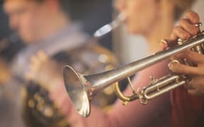 Trumpeter performing. (Photo by Tom Merton/Caia image/SCIENCE PH / NEW / Science Photo Library via AFP)