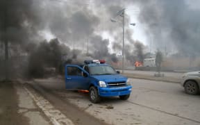 A burning police car in Ramadi.