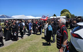 Dame Tariana Turia is carried from Whangaehu Marae to the nearby urupā where she will be laid to rest.