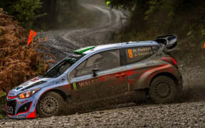 Hayden Paddon tries to control his Hyundai on a corner at the Wales Rally