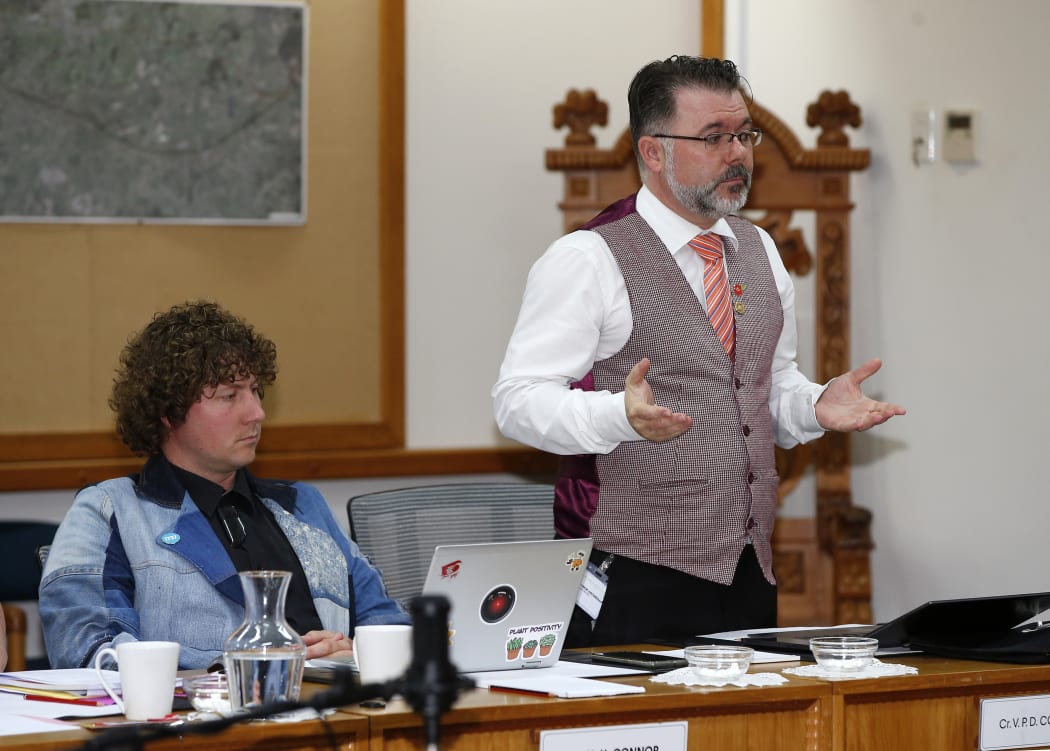 Councillor Vince Cocurullo (standing) speaks against his council voting for Māori seats at its November meeting.