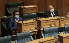 Independent MP Dr Gaurav Sharma sits next to Ex-speaker of the house Trevor Mallard as new Speaker Adrian Rurawhe starts his role