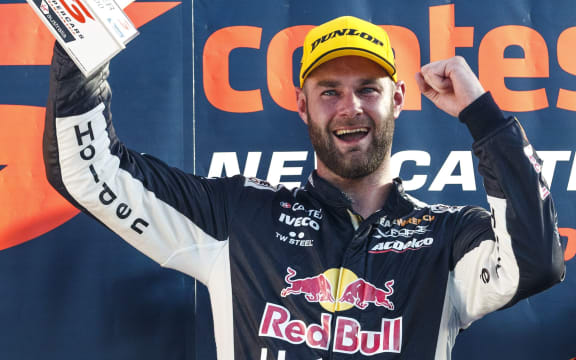 Shane van Gisbergen celebrates his race win in Newcastle.