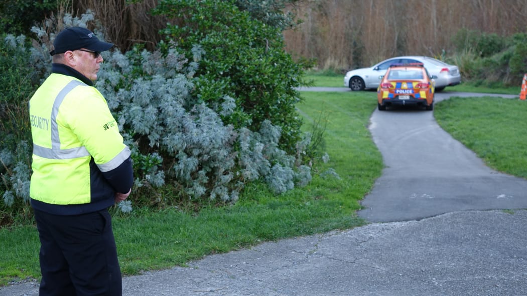 Police investigators at the scene of the attack in Melling.