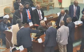 Vanuatu government MPs close ranks after the speaker moves to suspend 18 of their MPs, including the prime minister and deputy prime minister. 8 June 2021
