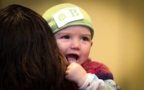 Hazel Kehoe Rowden, aged 7 months, came to support the new paid parent bill.
