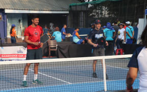 Pickleball players on court