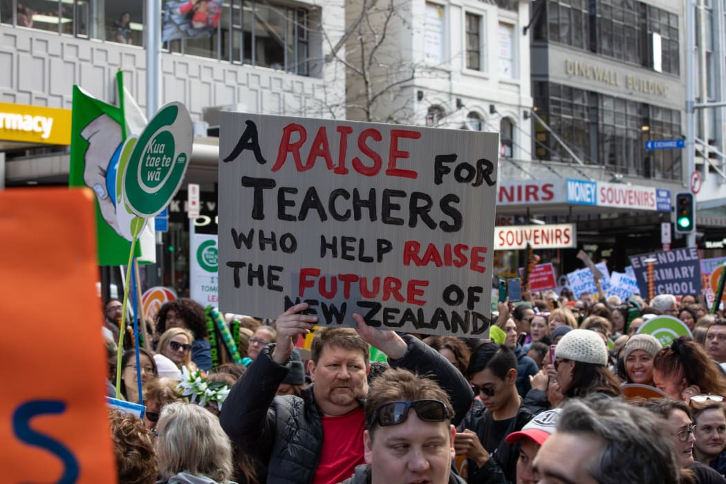 Families and children were out in force on Queen Street to support teachers on strike.