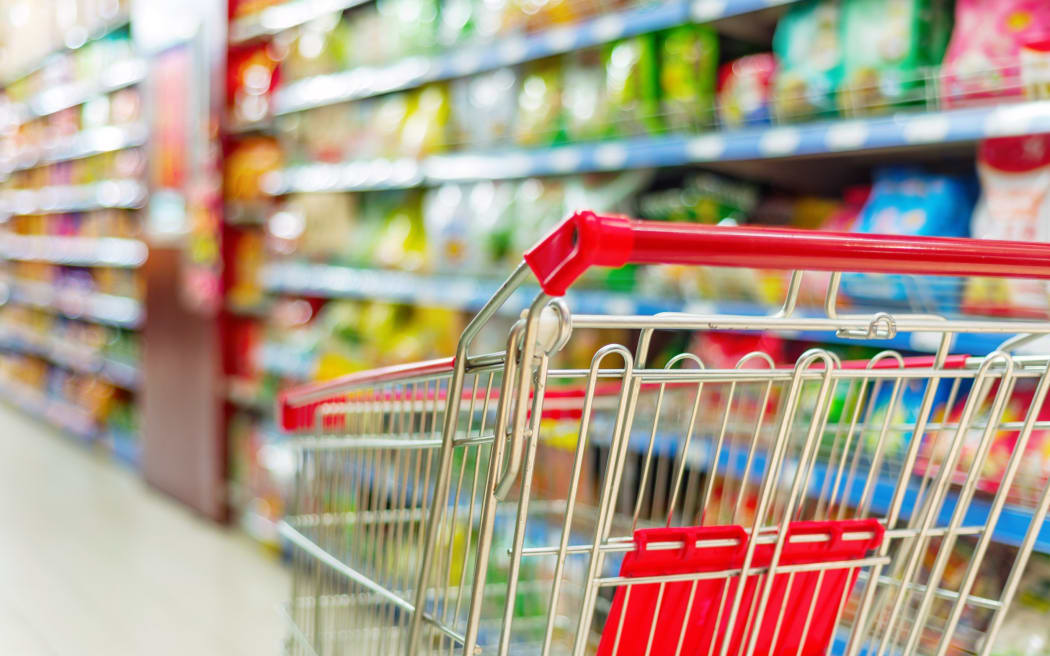 Empty shopping trolley in a supermarket