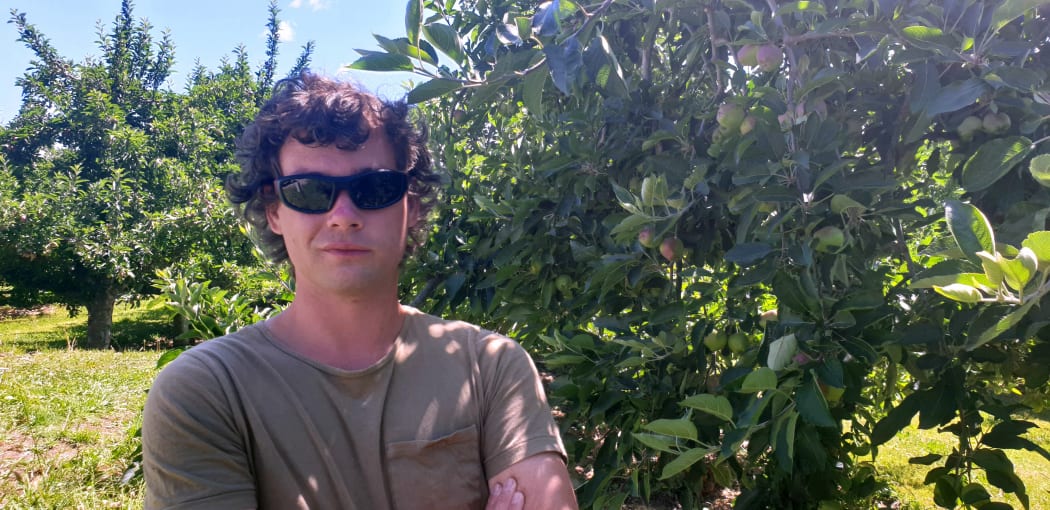 Luke Condon in the orchard.