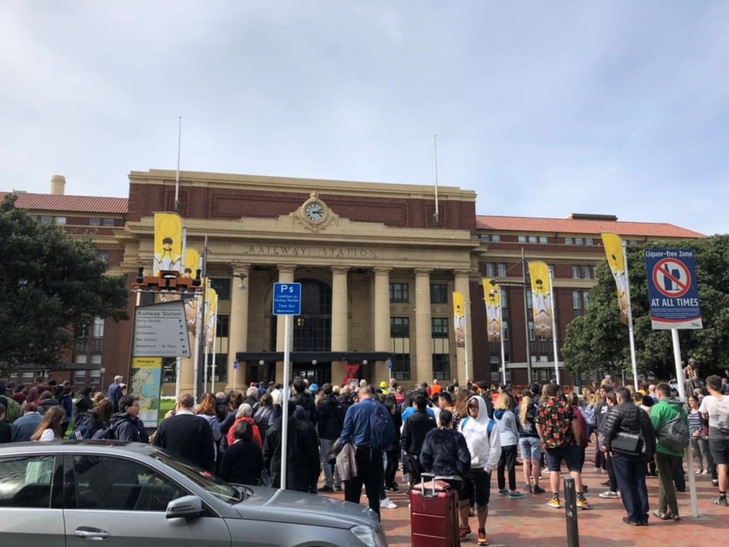 A crowd outside the central Wellington railway station, after a threat sparked an evacuation.