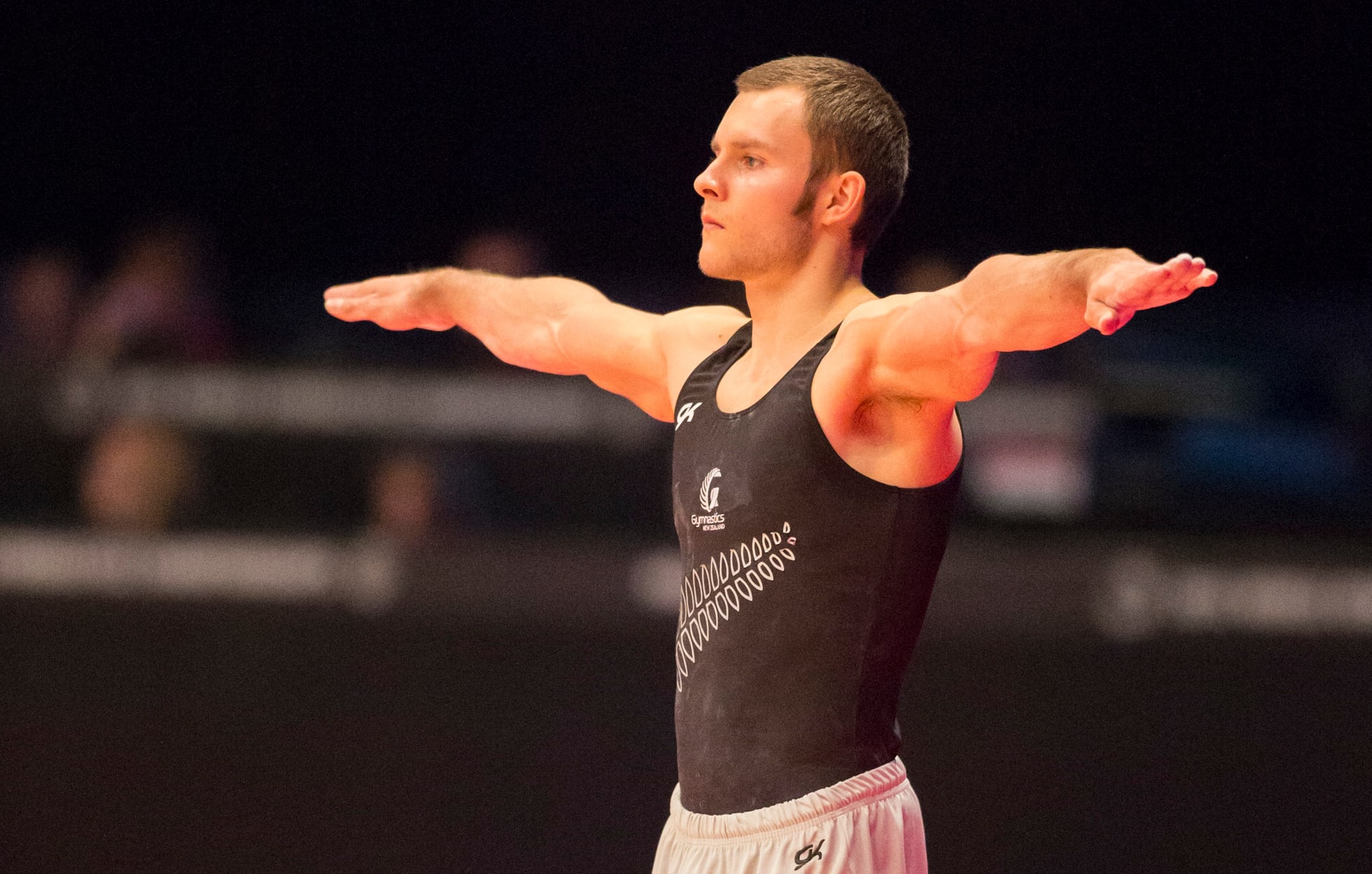 25.10.2015. Glasgow, Scotland. FIG Artistic Gymnastics World Championships. Day Three. Mikhail KOUDINOV (NZL) performs his Floor routine during the MAG Qualification.