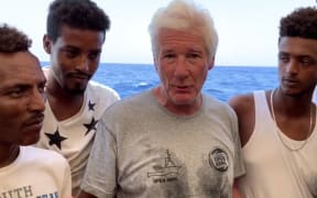 US actor Richard Gere on a Proactiva Open Arms boat transporting migrants rescued from the Mediterranean Sea.