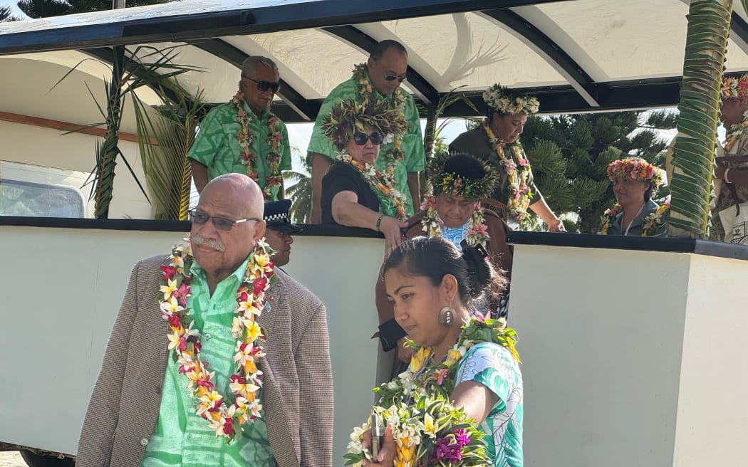 Fiji PM Sitiveni Rabuka, left, arrives to Aitutaki island for the Pacific Islands Forum Leaders Retreat. 8 November 2023.