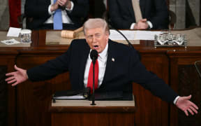 US President Donald Trump delivers the State of the Union address in the House Chamber of the US Capitol in Washington, DC, on February 24, 2026. (Photo by Brendan SMIALOWSKI / AFP)