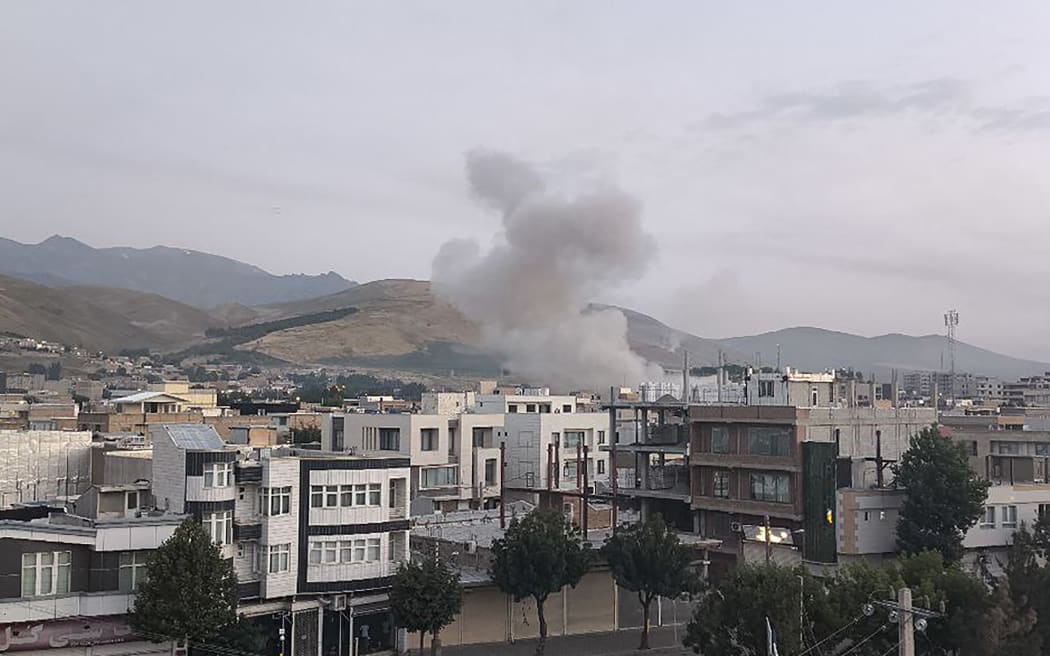 This handout photo released by Iran's Revolutionary Guard Corps (IRGC) official Sepah News Telegram channel on June 13, 2025 reportedly shows smoke billowing from a site targeted by an Israeli strike in the Iranian capital Tehran early in the morning. Israeli Prime Minister Benjamin Netanyahu said in a video statement in the early hours of June 13 that Israel carried out strikes on Iran and the military operation against the Islamic republic would  "continue for as many days as it takes". (Photo by SEPAH NEWS / AFP) / RESTRICTED TO EDITORIAL USE - MANDATORY CREDIT "AFP PHOTO / SEPAH NEWS  " - NO MARKETING NO ADVERTISING CAMPAIGNS - DISTRIBUTED AS A SERVICE TO CLIENTS