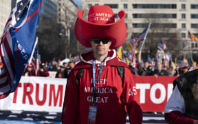 Supporters of US President Donald Trump rally at Freedom Plaza to protest the outcome of the 2020 presidential election on December 12, 2020 in Washington, DC. (Photo by Jose Luis Magana / AFP)