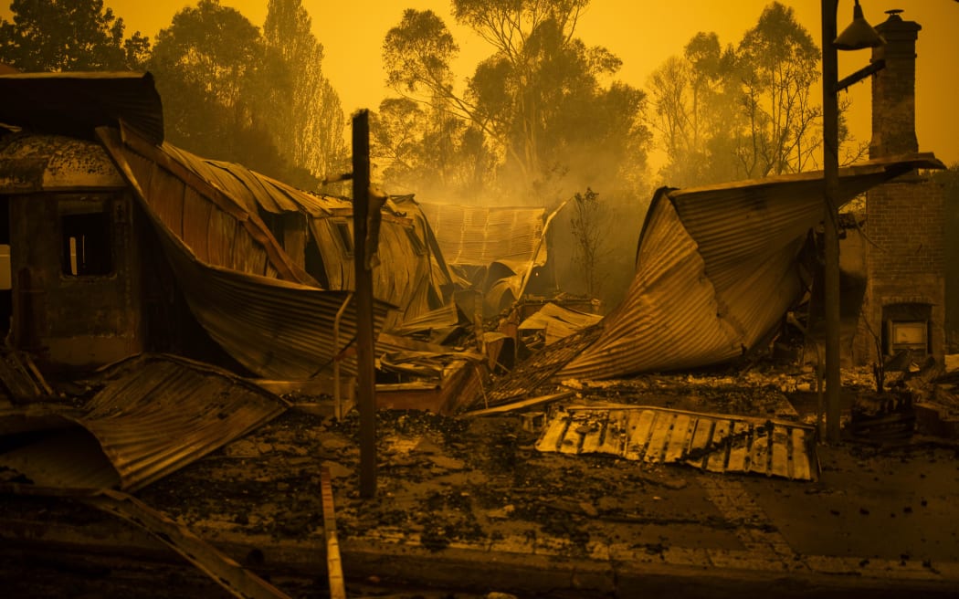 The remains of burnt out buildings are seen along main street in the New South Wales town of Cobargo on December 31, 2019, after bushfires ravaged the town.