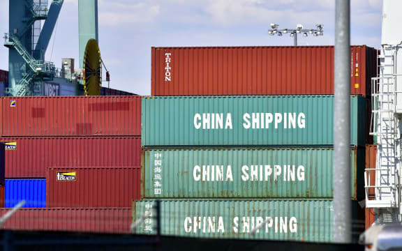 Containers are stacked on a vessel at the Port of Long Beach in Long Beach, California on July 6, 2018, including some from China Shipping, a conglomerate under the direct administration of China's State Council.