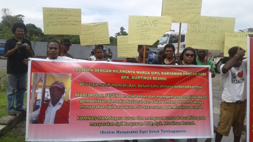 Demonstrators in Timika seek answers from Indonesian security forces over the disappearance of local Papuan Martinus Beanal.