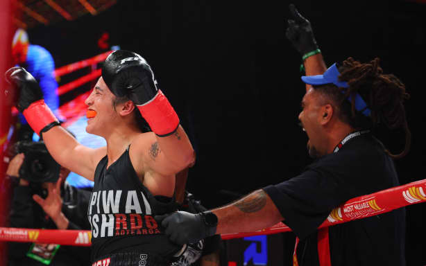 Kiwi boxer Lani Daniels claims three world titles with TKO victory | RNZ