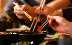 Sharing food in a restaurant