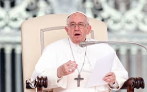Pope Francis delivers a speech as he leads his weekly general audience in St. Peter s Square.