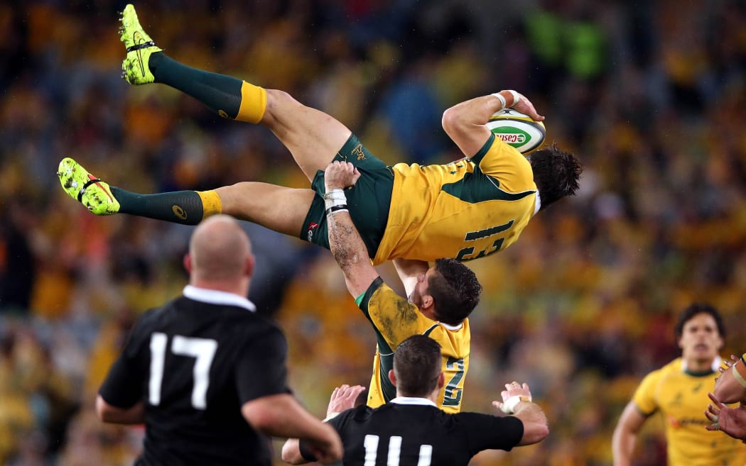 Adam Ashley-Cooper takes the kick off with support from Nathan Charles. Rugby Championship and Bledisloe Cup International Rugby Test Match, Australia Wallabies vs New Zealand All Blacks, Sydney, 16 August 2014.