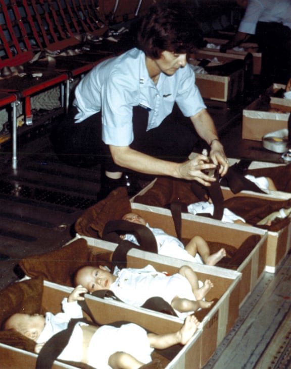 Some of the thousands of babies and children being transported out of Vietnam at the fall of Saigon.