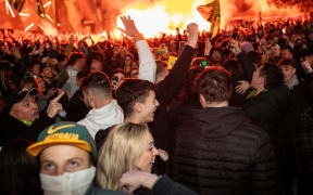 MELBOURNE, AUSTRALIA - AUGUST 16: Fans at Federation Square react after Australia scorers as they watch the Matildas FIFA World Cup Semi Final Game, on August 16, 2023 in Melbourne, Australia. (Photo by Darrian Traynor/Getty Images)