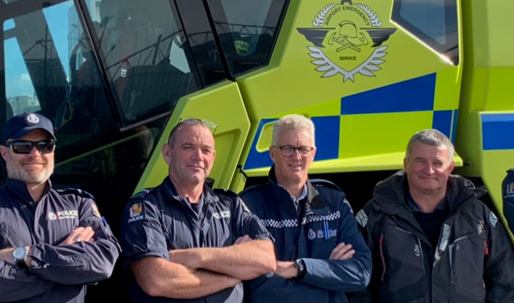 John Burridge, Senior Constable Kevin Stone on the far left with Constable Charlie Fowler on the right.