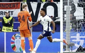 England's forward #19 Ollie Watkins celebrates after scoring his team's second goal during the UEFA Euro 2024 semi-final football match between the Netherlands and England at the BVB Stadion in Dortmund on July 10, 2024. (Photo by KENZO TRIBOUILLARD / AFP)