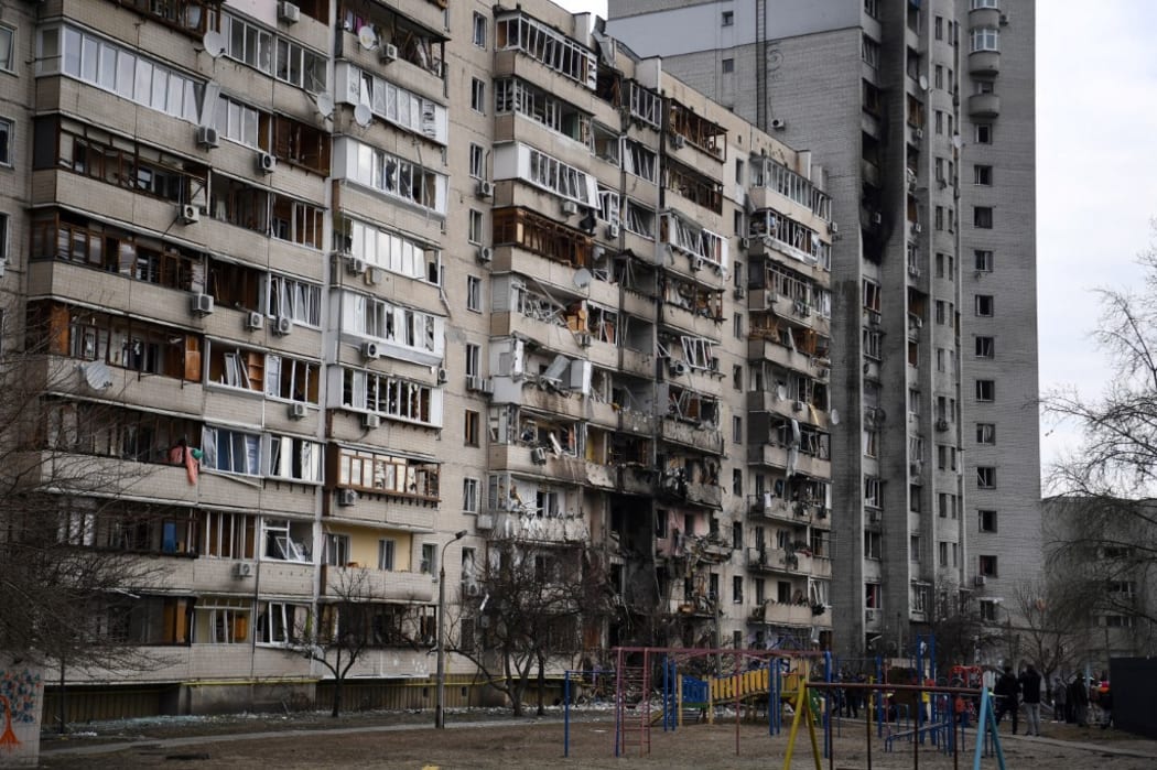 A general view of a damaged residential building at Koshytsa Street, a suburb of the Ukrainian capital Kyiv, where a military shell allegedly hit, on February 25, 2022.