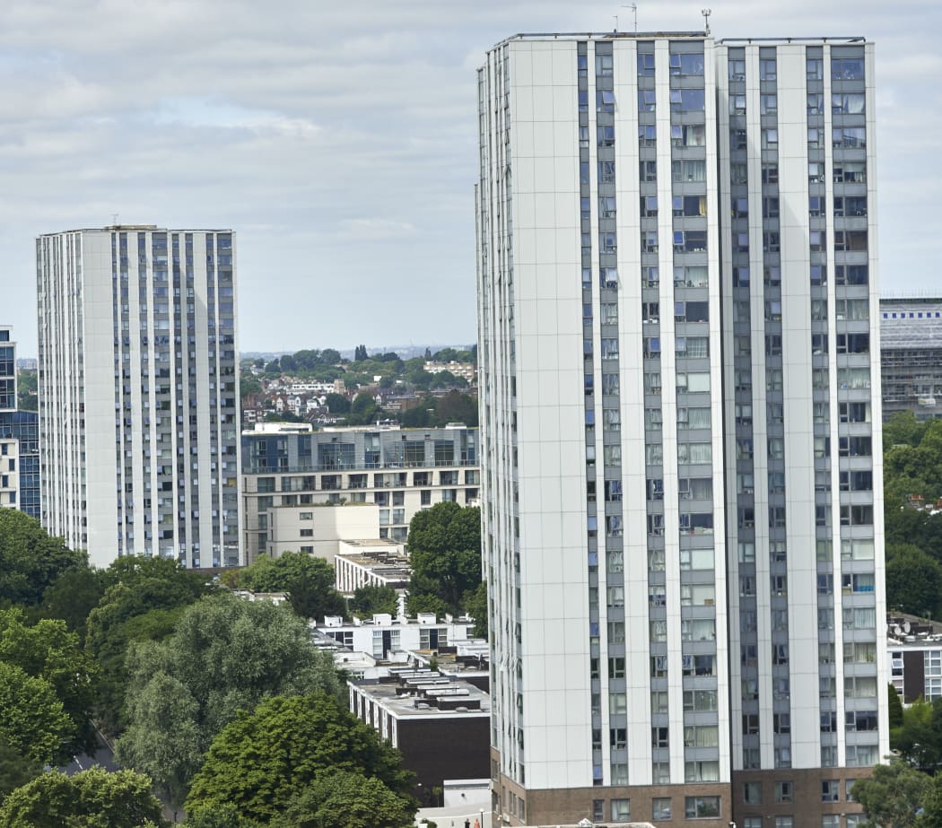 (L-R) The Taplow and Bray residential tower blocks on the Chalcots Estate are pictured in north London on June 23, 2017.