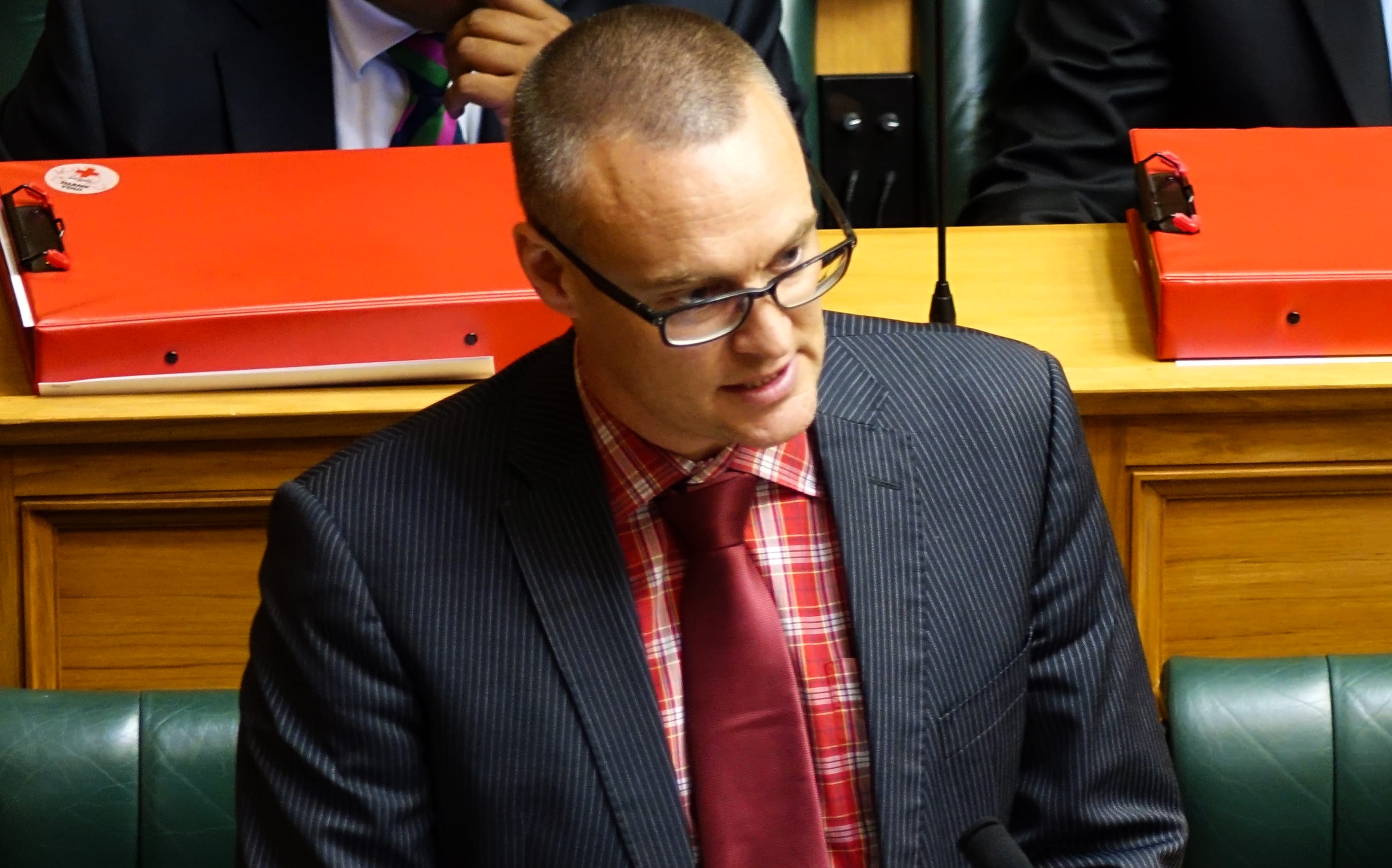 Labour MP Dr David Clark (left) and Labour MP Jacinda Ardern (right) in question time.